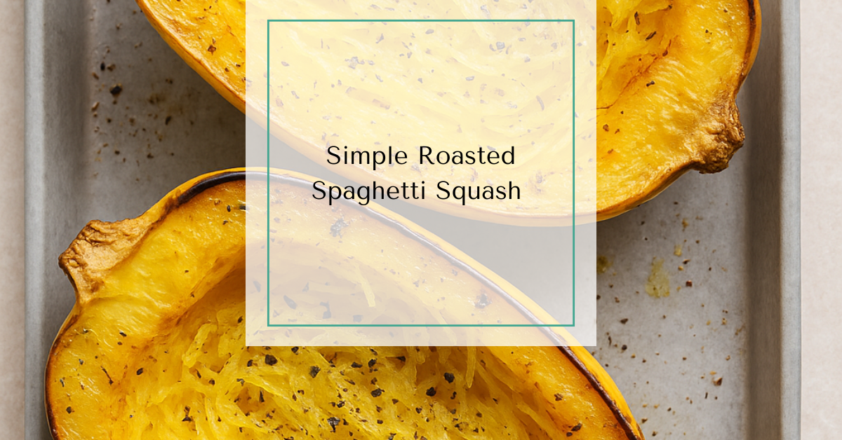 Halved and roasted spaghetti squash with golden, forked strands seasoned with olive oil and spices on a baking sheet.