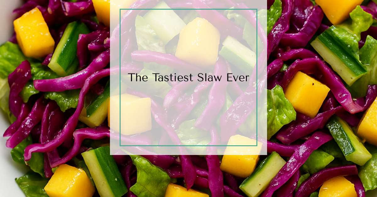 A vibrant slaw with red cabbage, mango, cucumber, and romaine lettuce tossed in a light vinaigrette.