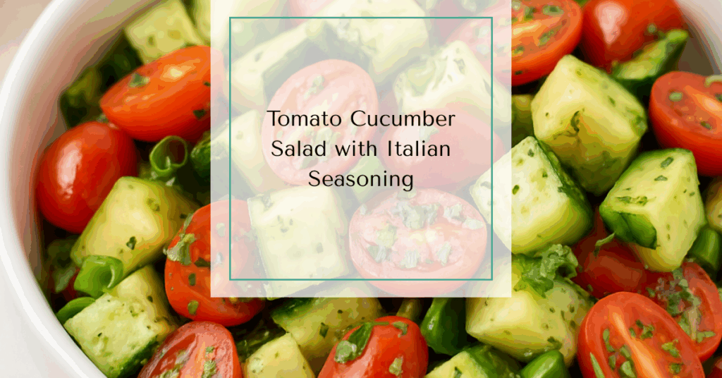  A bowl of vibrant tomato cucumber salad with fresh herbs and oil glistening on the vegetables.
