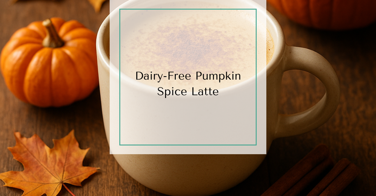 A steaming mug of golden pumpkin spice latte topped with a sprinkle of cinnamon, surrounded by pumpkin, cinnamon sticks, and autumn leaves.