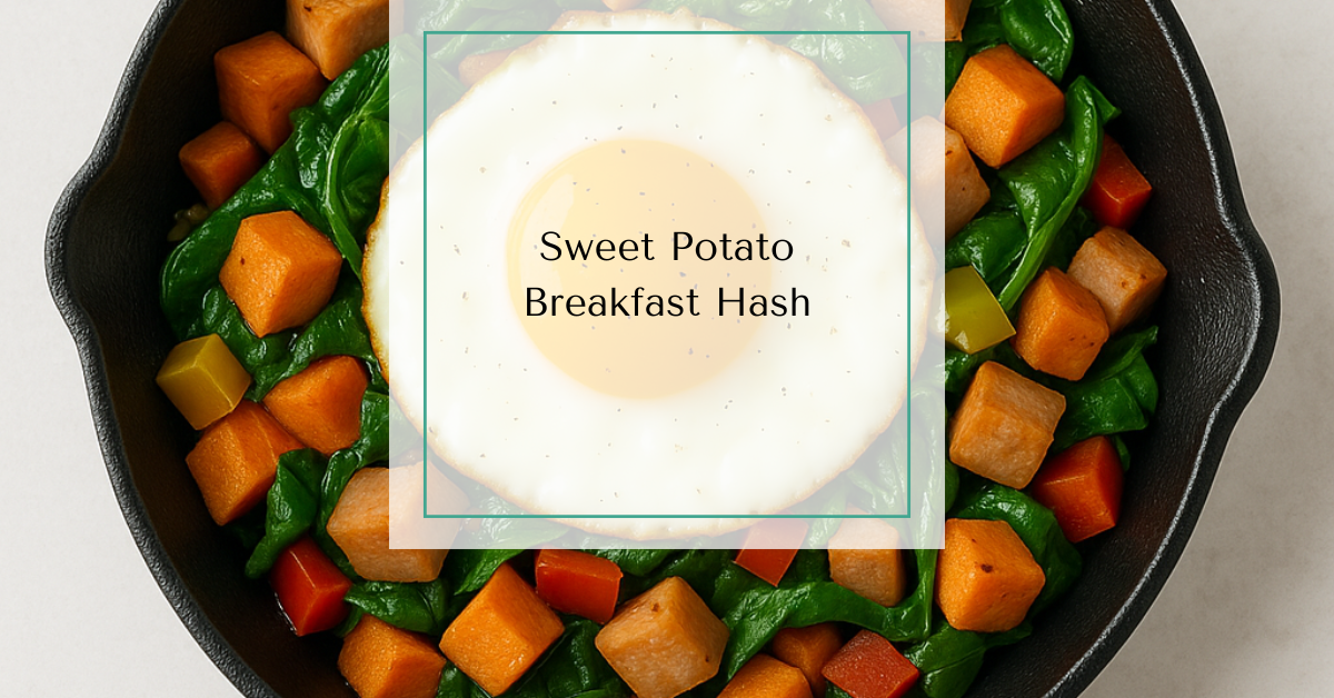 Skillet of roasted sweet potatoes, diced turkey sausage, spinach, and bell peppers topped with a fried egg.