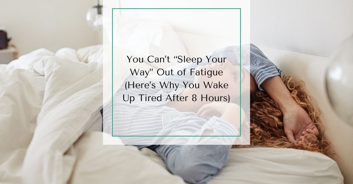 Woman lying in bed looking exhausted, with text overlay: “You Can’t ‘Sleep Your Way’ Out of Fatigue (Here’s Why You Wake Up Tired After 8 Hours).”