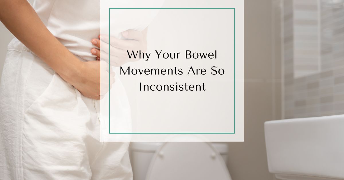 Woman standing in a bathroom holding her stomach with text overlay reading “Why Your Bowel Movements Are So Inconsistent.”