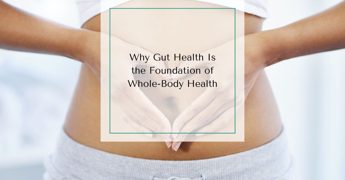 Woman holding her hands in a heart shape over her abdomen with text overlay reading “Why Gut Health Is the Foundation of Whole-Body Health.”