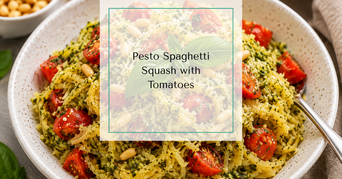 A bowl of pesto spaghetti squash tossed with fresh basil pesto, juicy cherry tomatoes, toasted pine nuts, and fresh basil leaves with text overlay reading "Pesto Spaghetti Squash with tomatoes”