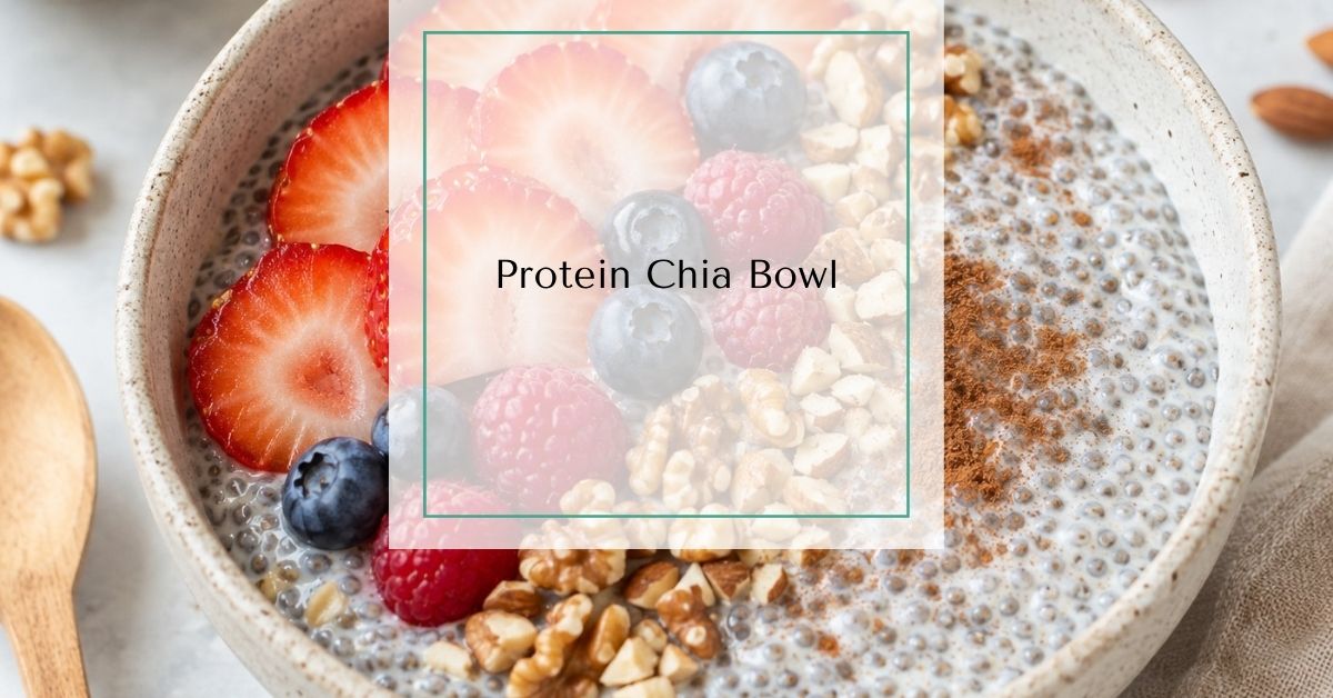 Protein chia bowl topped with strawberries, blueberries, raspberries, chopped walnuts, almonds, and cinnamon with text overlay "Protein Chia Bowl".